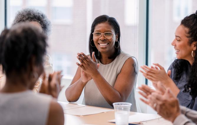 People discussing at a meeting