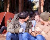 Family outside their tent