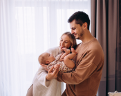 Parents holding their baby