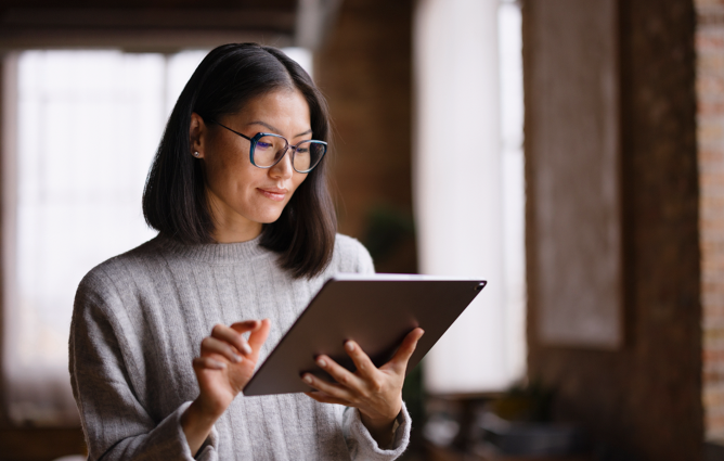 Lady looking at ipad